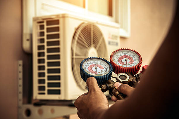 Professional Air Conditioning Service technician working in Santa Clara, UT